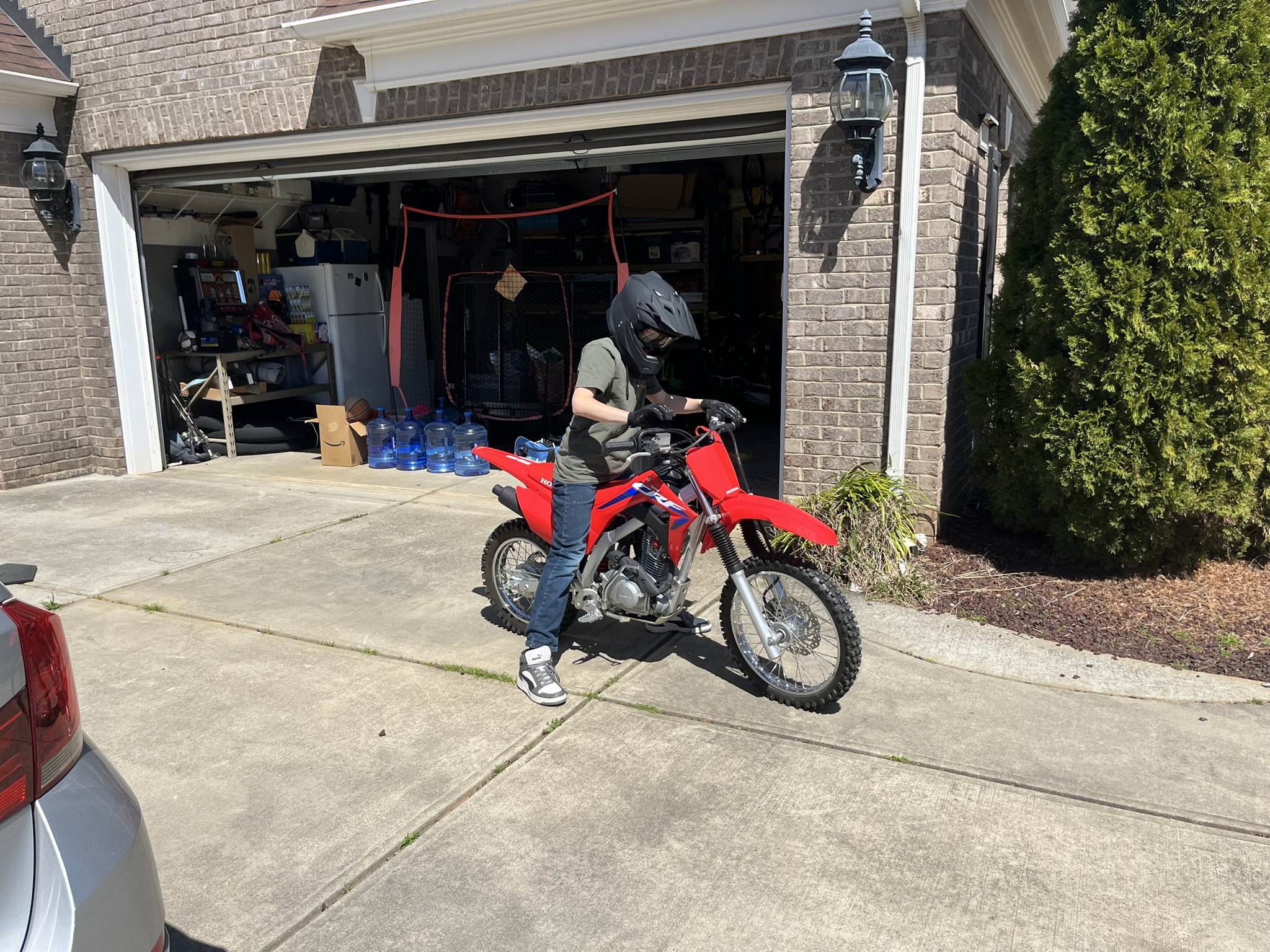 Michael pulling out of driveway on Honda