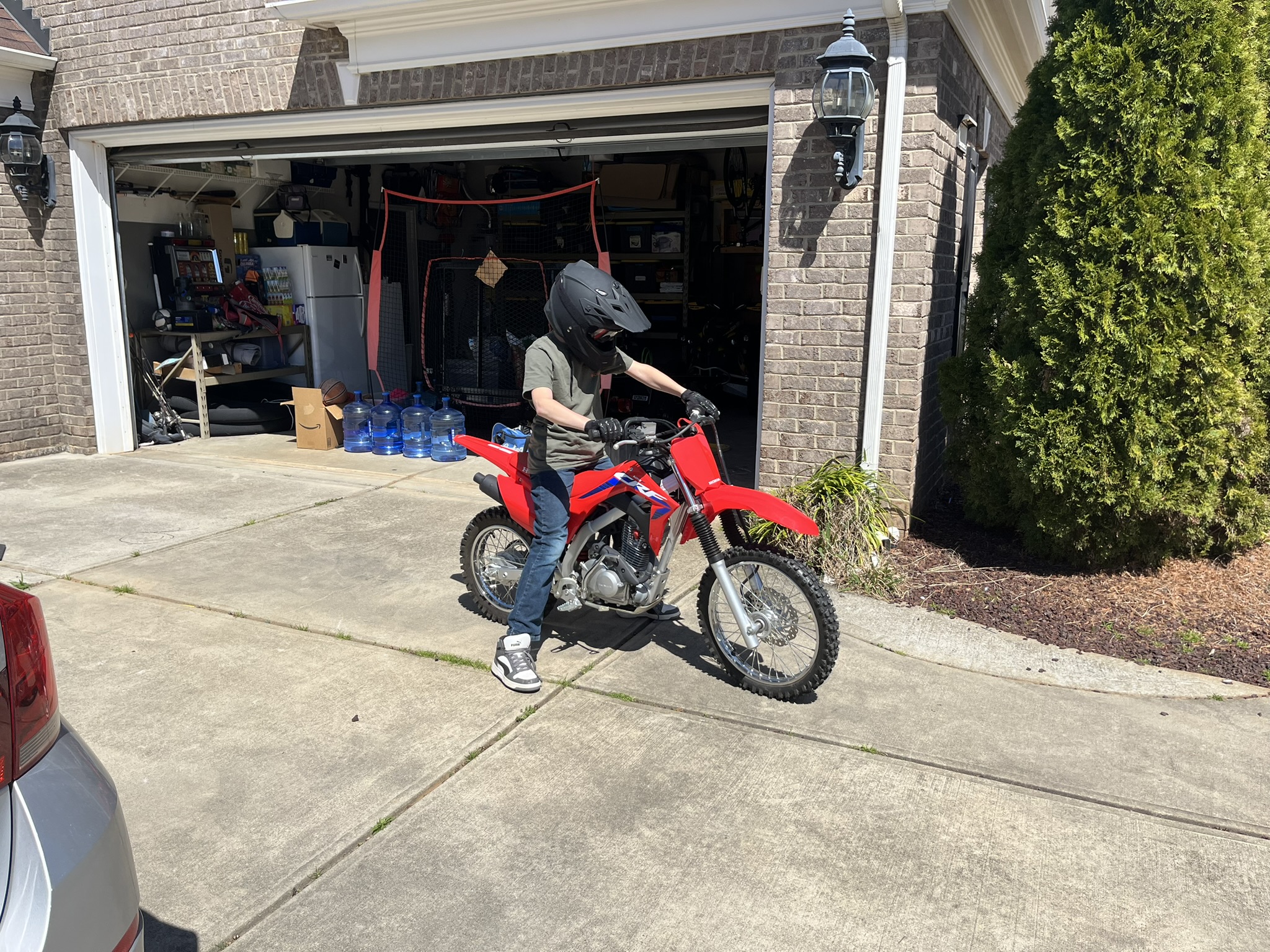 Michael on Honda in driveway