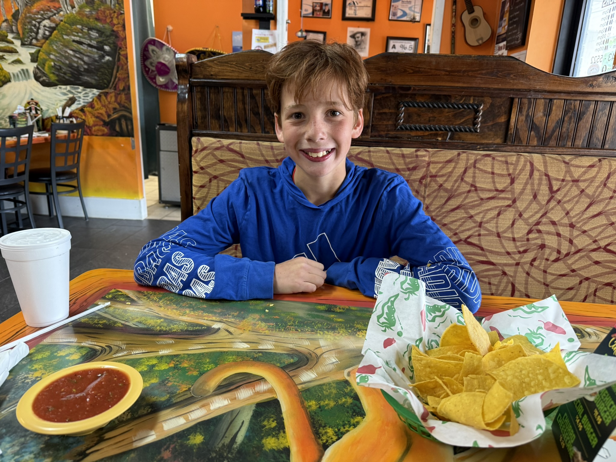 Michael smiling at restaurant